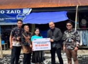 Komitmen BRI KC Sidrap, Serahkan BRI Insurance Klaim Asuransi pada Korban Kebakaran Pasar Dongi Sidrap